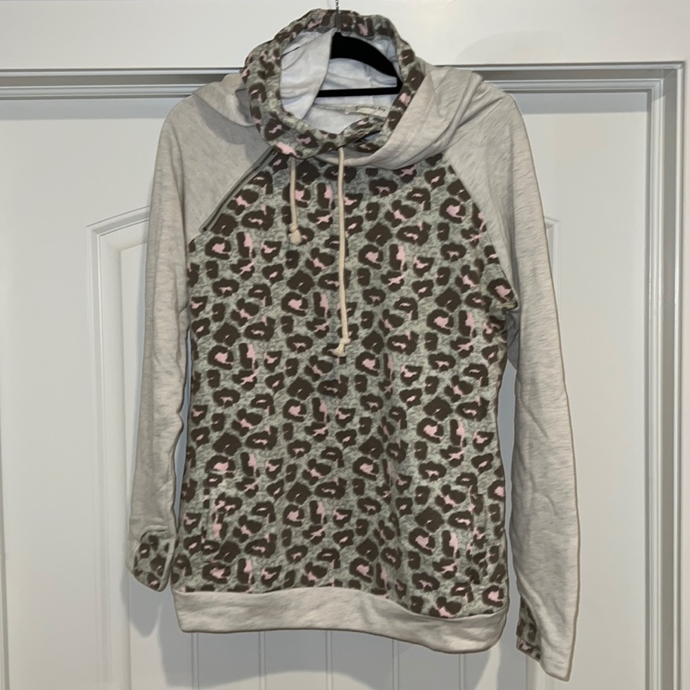 Double hood long sweat shirt with thumb hole. Very cute and cozy.Local boutique.